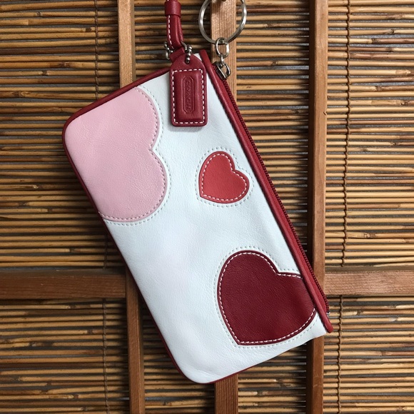 Handbags - Coach wristlet with hearts
